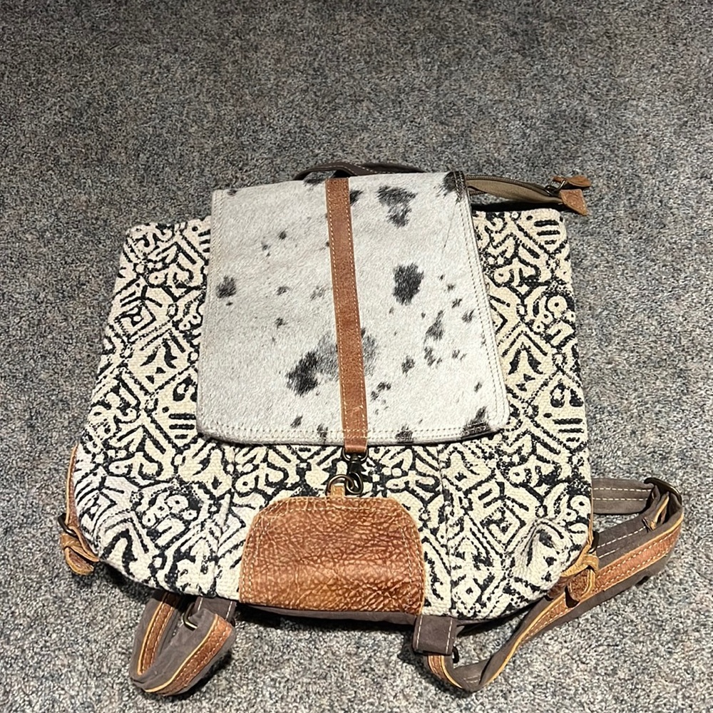 Brown woven backpack purse